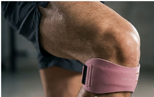 Knee wearing the KineticStrap during impact
